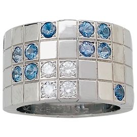 Bague Cartier "Lanière" en or blanc, diamants et saphirs. Autre
