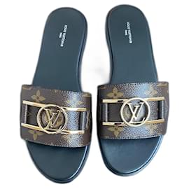 Louis Vuitton Lock it flat mule Brown