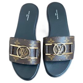 Louis Vuitton Lock it flat mulo Marrone