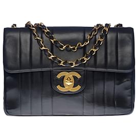 Chanel-Majestic Chanel Jumbo single flap bag handbag in black quilted lambskin, vertical stitching, gold metal trim-Black