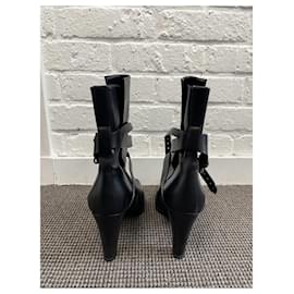 Hermès-HERMES Black leather ankle boots-Black
