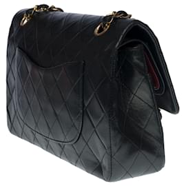 Chanel-The coveted Chanel Timeless Medium bag 25 cm with lined flap in black leather, garniture en métal doré-Black