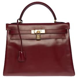 Hermès-Magnífica bolsa Hermès Kelly 32 devolvido em couro bordô (H vermelho), guarnição de metal banhado a ouro-Bordeaux