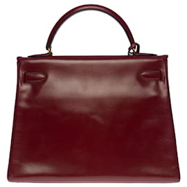 Hermès-Magnífica bolsa Hermès Kelly 32 devolvido em couro bordô (H vermelho), guarnição de metal banhado a ouro-Bordeaux