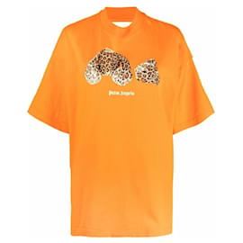 Palm Angels-T-shirt a maniche corte con stampa grafica Palm Angels-Arancione