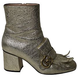 Botins Gucci Marmont com franjas em couro dourado Dourado Metálico