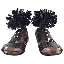 Autre Marque-Alaia sandals in black cut-out leather with raffia ankle trim-Black