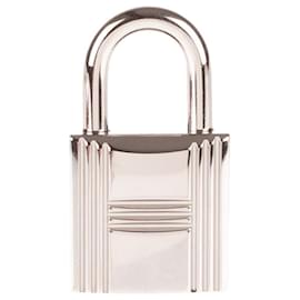 Hermès-Cadeado Hermès em metal paládio prata para bolsas Birkin ou kelly, nova condição com 2 chaves e bolsa original!-Prata