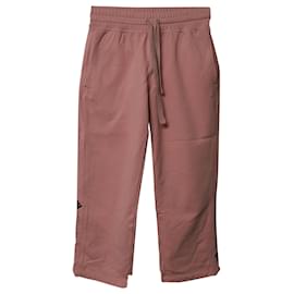 Autre Marque-Adidas by Stella McCartney Pantalon de survêtement court à ourlet asymétrique en coton rose-Rose
