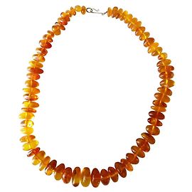 Autre Marque Collar de ámbar transparente natural con vetas Naranja