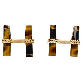 Gemelli Boucheron in oro giallo e occhio superiore . Altro