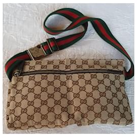 Gucci-Gucci GG bolsa de cintura de lona Marrom-Marrom