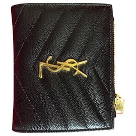 Yves Saint Laurent Monederos, carteras, casos Negro