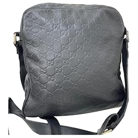 Gucci-Unisex leather messenger bag-Black