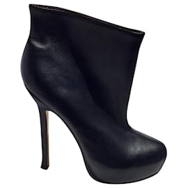 Yves Saint Laurent-Trip Too ankle boots black leather golden lining and soles-Black