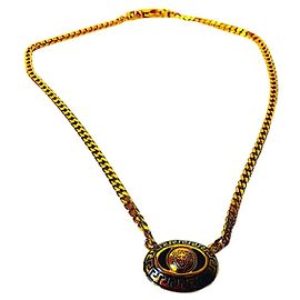 Gianni Versace Collier pendentif médaillon Vintage Medusa Bijouterie dorée