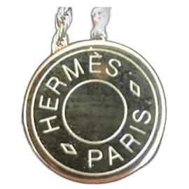 Hermès-Pendentif Hermès Clou de Selle-Argenté