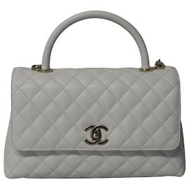 Bolsa Chanel Diamond acolchoada com alça superior em couro caviar branco Branco