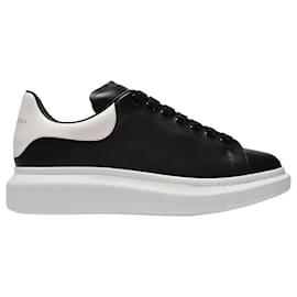 Alexander Mcqueen-Oversized Sneakers in Black Leather and white Heel-Black