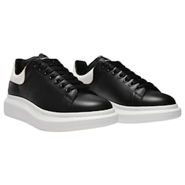 Alexander Mcqueen-Oversized Sneakers in Black Leather and white Heel-Black