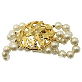 Salvatore Ferragamo-Bracelet Salvatore Ferragamo en fausses perles avec fermoir circulaire en métal doré-Doré