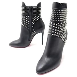 Christian Louboutin-NUOVE SCARPE CHRISTIAN LOUBOUTIN STIVALI UNGHERI CON SPIKE 38.5 NUOVA PELLE-Nero