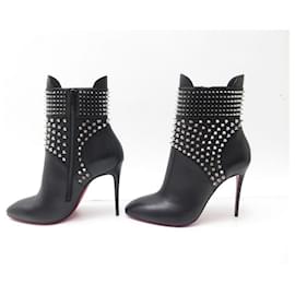 Christian Louboutin-NUOVE SCARPE CHRISTIAN LOUBOUTIN STIVALI UNGHERI CON SPIKE 38.5 NUOVA PELLE-Nero