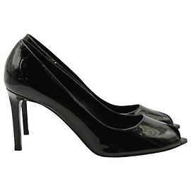 Saint Laurent Peep Toe Pumps in Black Patent Leather  Black