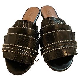 Alaïa Lederpantoletten mit Fransen Schwarz Schwarz