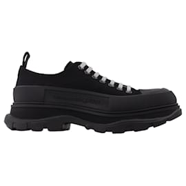 Alexander Mcqueen-Tread Slick Sneaker in Black Leather-Black