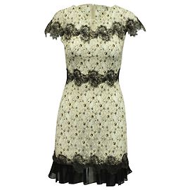 Sandro Paris Zweifarbiges Spitzenkleid aus weißem und schwarzem Polyester Weiß