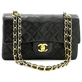 Chanel-Chanel 2.55 gefütterte Klappe 9" Ketten-Umhängetasche Schwarzer Lammfell-Quilt-Schwarz