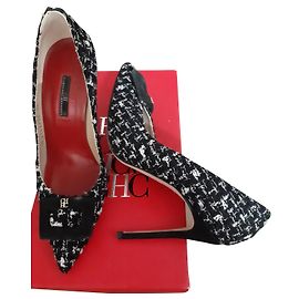 Carolina Herrera Tacchi Altro