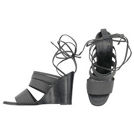 Sandali Hermès con tacco a blocchi di legno nero e cinturini grigi Grigio