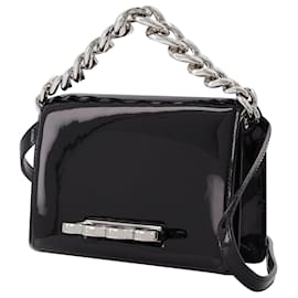 Alexander Mcqueen-Mini-Kettentasche mit vier Ringen aus schwarzem Lackleder-Schwarz