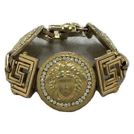 Gianni Versace Dourado