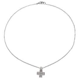 Colar Pomellato, "Cruz", ouro branco e diamantes. Outro