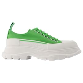 Alexander Mcqueen-Tread Sneakers in White/Silver Leather-Multiple colors