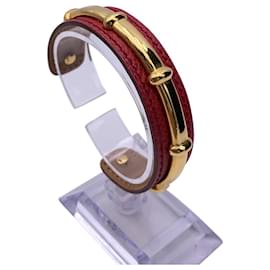 Hermès-Bracelet manchette Hermes en cuir rouge et métal doré Agatha-Rouge