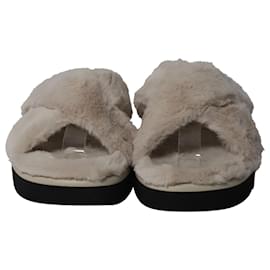 Stuart Weitzman-Stuart Weitzman Roza Lift Slides Sandals in Cream Faux Fur-White,Cream