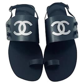 Chanel-Sandalo infradito Chanel in pelle nera TAGLIA 37,5-Nero