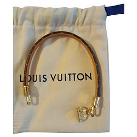 Bracelet Louis Vuitton Alma toile Monogram Marron