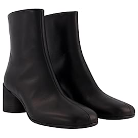 Maison Martin Margiela-Black leather ankle boots-Black