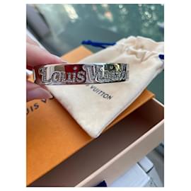 Cash USA Pawnshop. Louis Vuitton cowhide leather bracelet M6609D pre owned  with case and dust bag. pre owned. very good condition.
