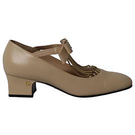 Sapatilhas Gucci Bonny Crystal & Chain decoradas com laço em couro creme Branco Cru