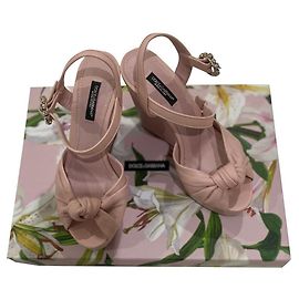 Sandales à talon compensé Dolce & Gabbana rose en fourrure 36 Rose