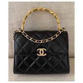 Chanel-Clutch aus schwarzem Lammleder mit Überschlagtasche und Henkel-Schwarz