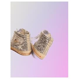 Golden Goose Deluxe Brand-Slide sneakers with laminated leather upper and silver glitter-Silvery