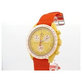 Omega-NEW OMEGA MOONSWATCH MISSION TO THE SUN WATCH033J100 ct quartz 42MM WATCH BOX-Golden