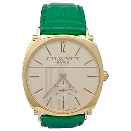 Reloj chaumet, "Dandy" en oro amarillo sobre cuero. Otro